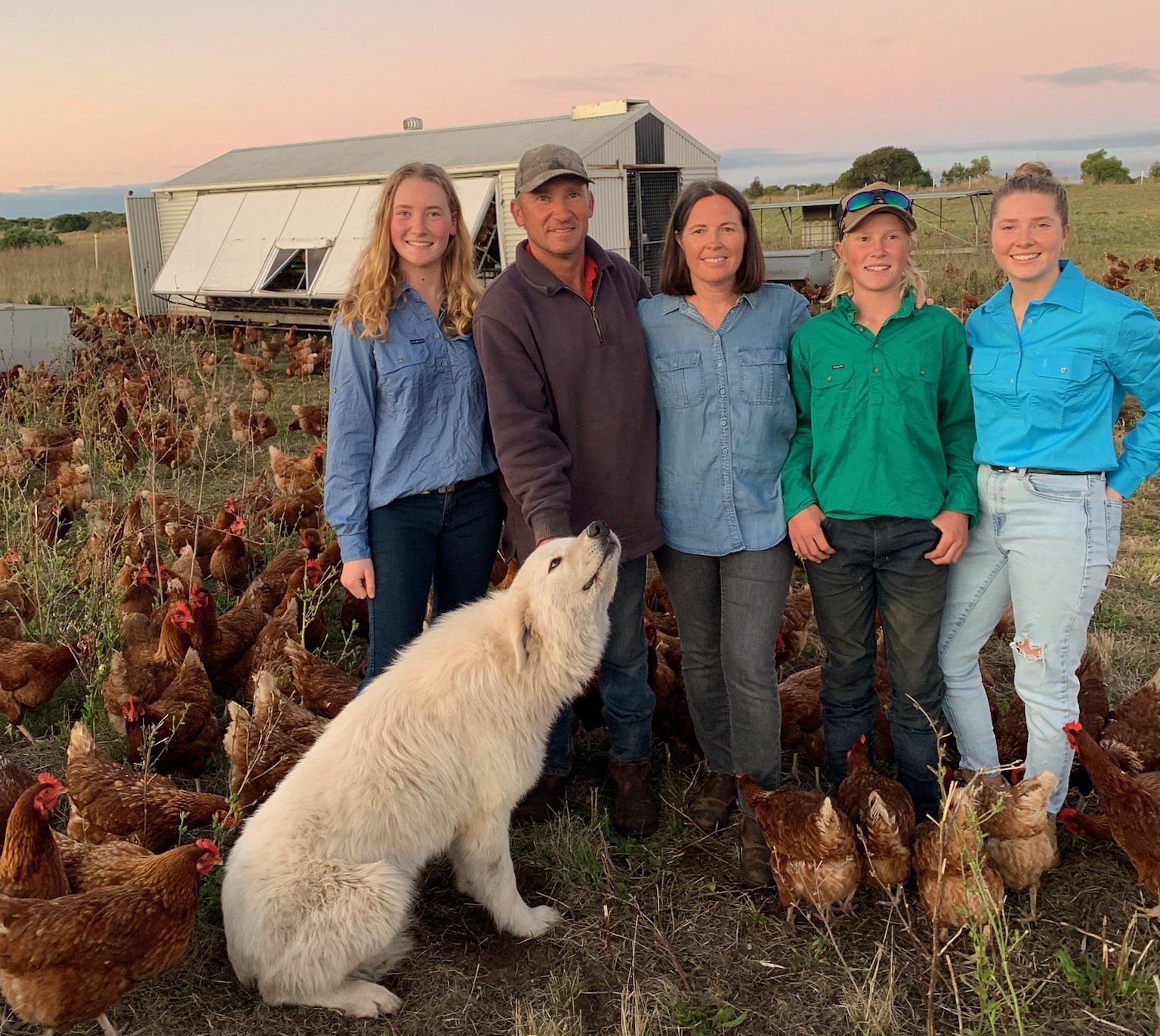 RIC loan customers and eggs farmers standing together